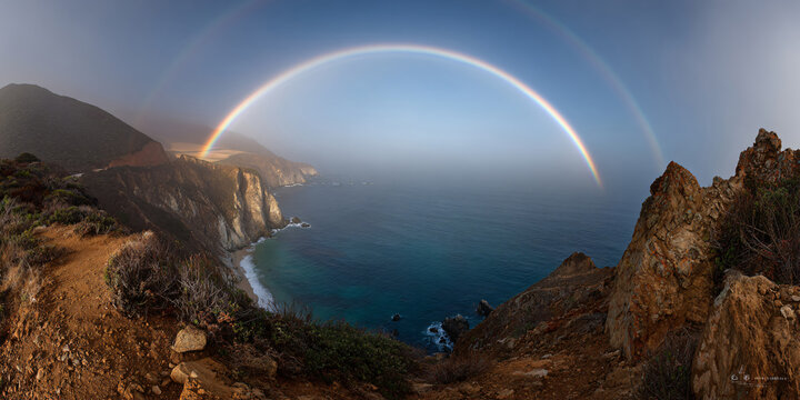 Double Rainbow over Dramatic Ocean Coastal Cliff