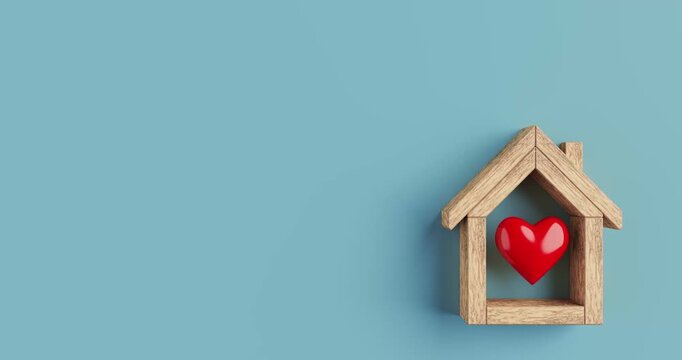 4k Resolution Video: Home Care Concept. Wooden House Frame With Red Heart Symbol Built Animation On Blue Background With Copy Space And Alpha Matte