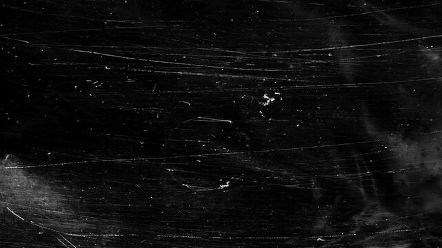 Professional grunge film transition for films, adding gritty motion. dynamic vintage damaged texture 4k background looped smooth animation.
Old film dust analog video overlay for visual effects.