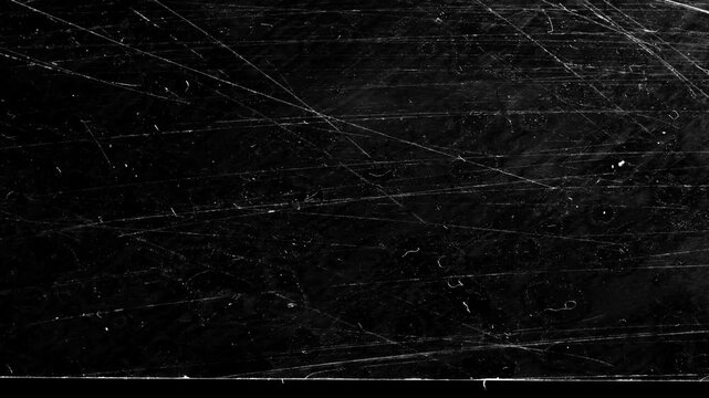 Dark grunge concrete texture with scratches and noise background, Stop motion grunge aesthetic with textured surface and scratches.
Old film effect flicker negative film grunge rough vintage video.