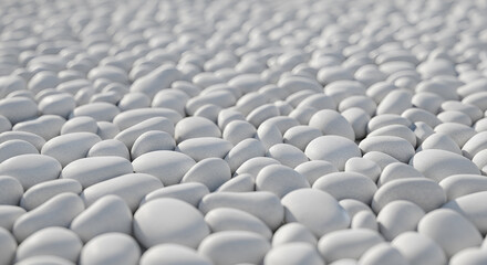 Obraz premium High angle view of continuous texture full of small white smooth pebbles under soft light