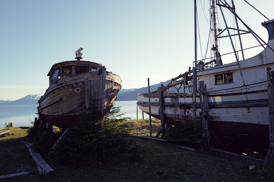 fishing ships on the hard in a state of decay, Alaska, Icy Strait point shoreline