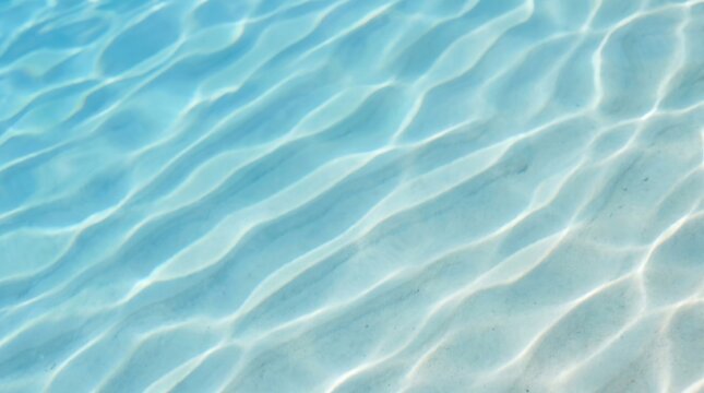 Clear blue water surface with ripples