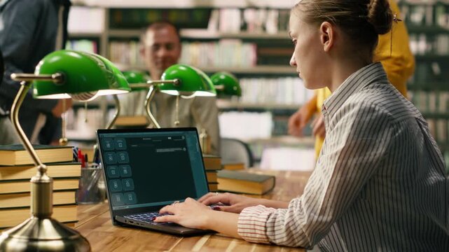 Student using AI study assistant interface typing on laptop at library table, near classmates and green lamps, modern automation tools in education and online learning, with education technology.