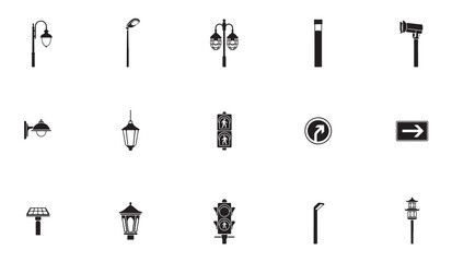 Set of urban street lights, pedestrian signals, security camera and road signs in silhouette. © MDIKRAM