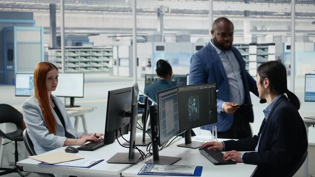 Microchip R&D factory professionals reviewing production using neural network AI assistant, quality control engineers use deep learning LLM to upgrade semiconductor hardware, with AI workflow context.