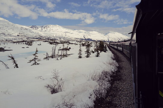 majestic spring snowmelt lakes viewable from the railway from Skagway to Canada, Yukon trail