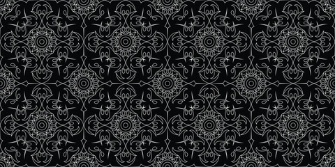 Fototapeta premium Seamless gothic mandala pattern. Elegant dark abstract line art, perfect for bandana design, alternative apparel printing, luxury wallpaper, vintage fabrics, and mystical background textures.