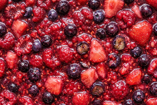 Full frame close up of mixed berry jam or compote texture