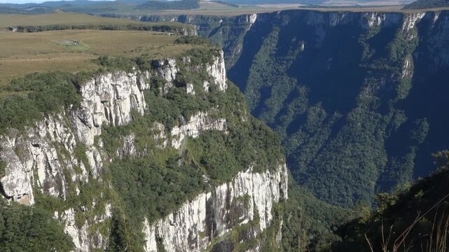 tilt up reveals a splendid gorge in Cambara do Sul, Rio Grande do Sul, Brazil. panoramic