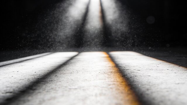 Volumetric sun rays shining through window onto floor with dust particles