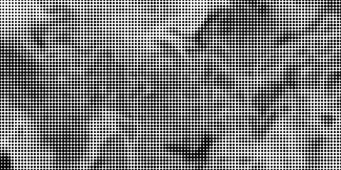 Halftone faded gradient texture. Grunge halftone grit background. White and black sand noise wallpaper. Retro pixilated vector backdrop © Mansur