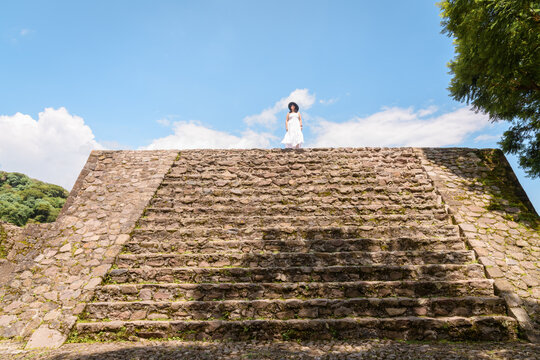 Woman Standing Victorious on Top of Ancient Pyramid in Malinalco