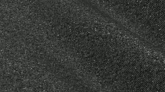Irish Charcoal Gray Flecked Tweed Fabric rippling in rich waves of traditional donegal style texture with colorful neps for luxury winter coats