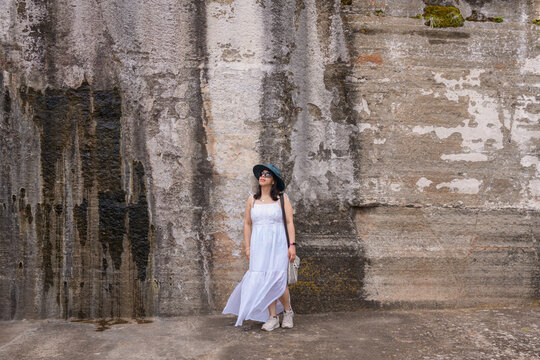 Woman Standing with Arms Raised Overlooking Malinalco Valley