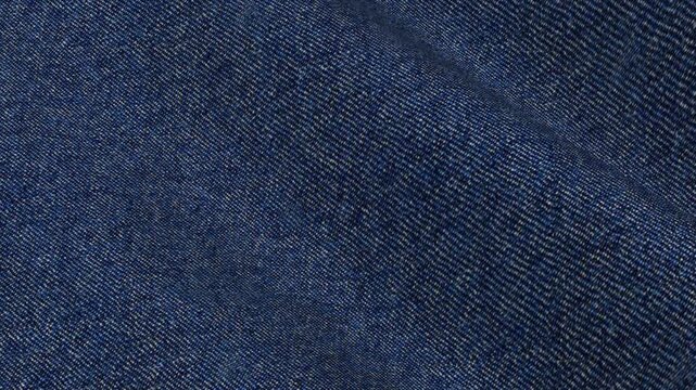Italian Blue Twill Flannel Wool Fabric flowing in elegant waves of diagonal weave and soft brushed cozy texture for premium mens sport blazers