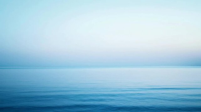 Tranquil ocean horizon scene with gradient sky and calm water visuals