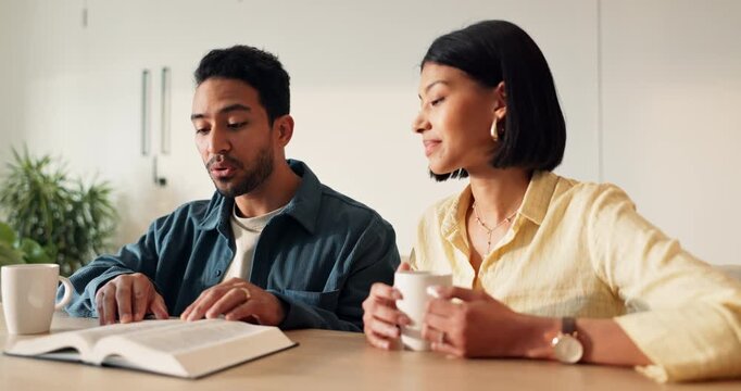 Couple, relax and reading in home with bible, study scripture and morning prayer for guidance. Bonding, people or coffee at house with holy book, religious practice or knowledge for spiritual healing