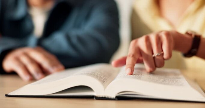 Hands, couple and reading in home with bible, study scripture and morning prayer for guidance. People, relax and faith at house with holy book, religious practice and knowledge for spiritual healing
