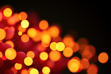 Fototapeta premium Blurry warm-toned lights, red and yellow bokeh circles, dark background