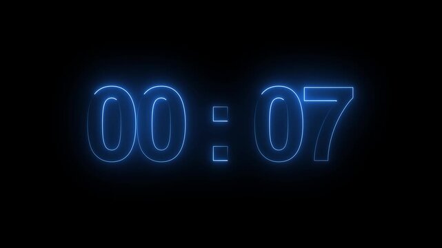 Timer displaying seven seconds remains shown in soft glowing blue neon font against a deep pitch black background to indicate a measured duration countdown for a professional production task sequence.
