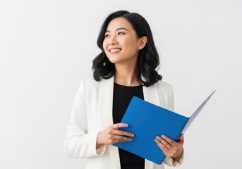Fototapeta premium Smiling woman holding blue tablet and digital pen