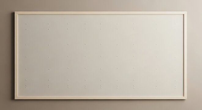 Minimalist wall art with a light wooden frame and a beige panel featuring a symmetrical grid of small, raised circular studs or rivets