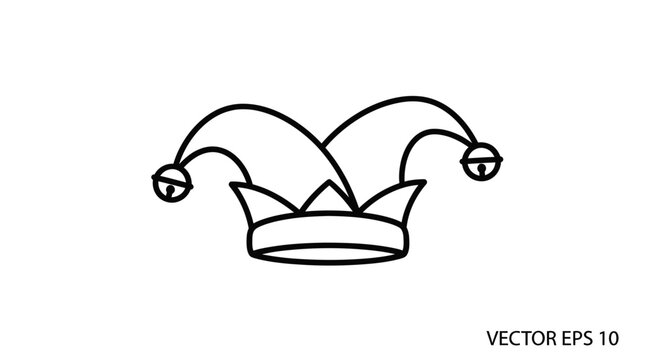 A jester's hat sits alone on a plain surface indoors.