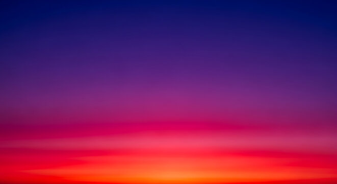 Sunset sky with deep purple and fiery orange gradient background colorful atmosphere abstract peaceful cloudless