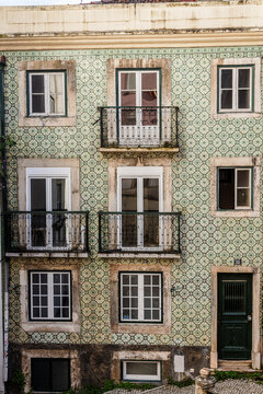 Facade decorated with azulejos in the old town of Lisbon, Portugal.
