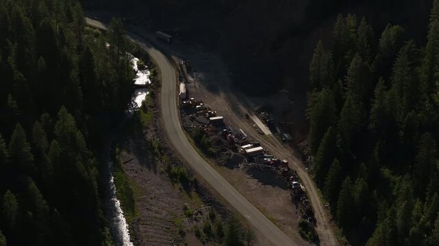 Aerial of rural mountain road and forest near Kellogg Shoshone County Idaho in spring
