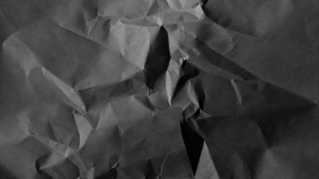 Textured Gray Crumpled Paper Close-up abstract background