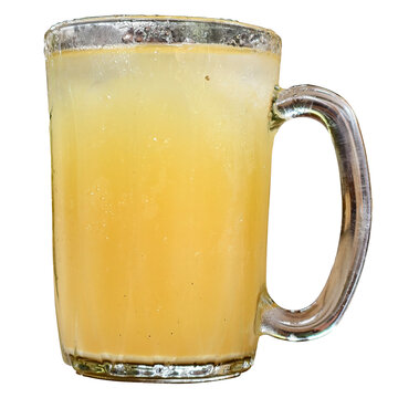Cold herbal drink of Beras Kencur in a classic cup with handle, offers healthy summer freshness and hydration