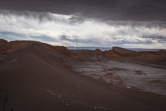Storm clouds gather over Atacama desert valley