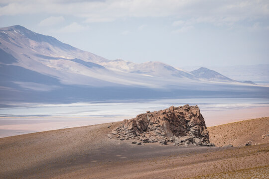 Piedras Rojas rock formation over Atacama salt flat