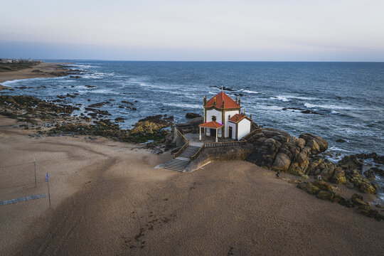 Capela do Senhor da Pedra on a beach in Portugal