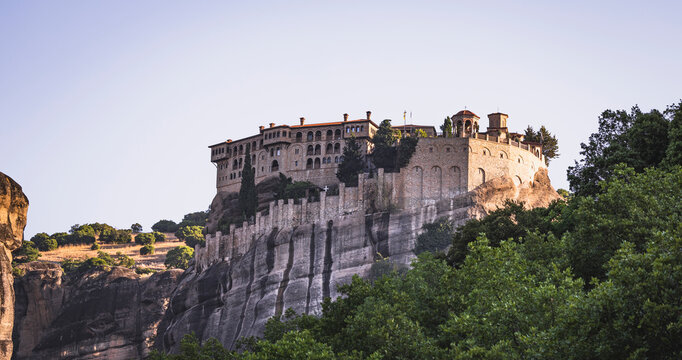Meteora monastery perched majestically atop a sheer cliff