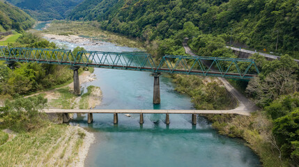Fototapeta premium Mishima Chinka Bridge and Railway Bridge over the Shimanto River in Kochi