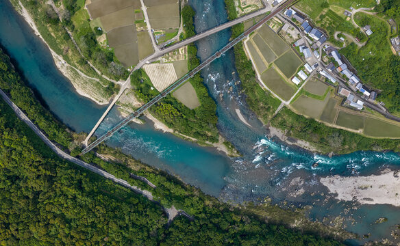 Top-Down Aerial View of Mishima Chinka Bridge, Railway Bridge, and the Shimanto River