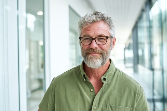 The Distinguished Older Man Portrait in Bright Modern Corporate Office
