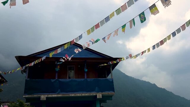Cinematic mountain view with Om Mani Padme Hum Flag
