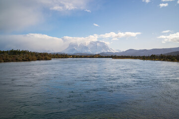 Obraz premium Patagonia mountain lake under blue sky and cloud with calm water