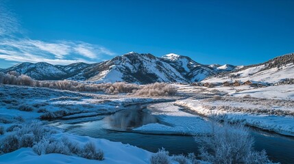Fototapeta premium A Serene Winter Landscape with a Meandering River, Snow-Covered Plains, and Majestic Mountains