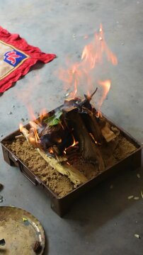 Holi Fire Ritual During Hindu Puja Ceremony with Sacred Flames