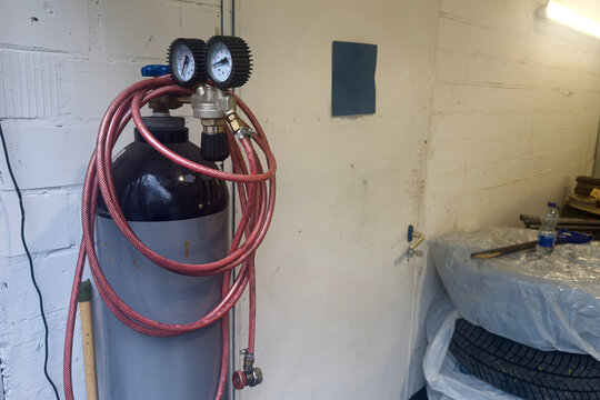 A gas cylinderin in a workshop prepares for projects