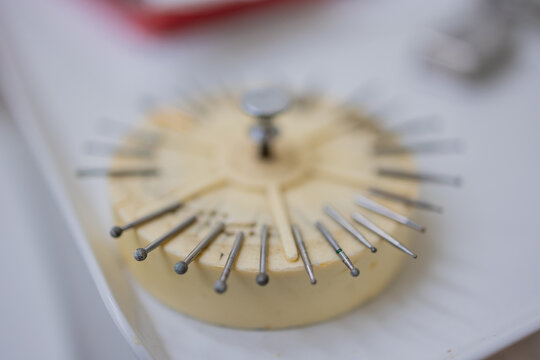 Dental Drill Bur Collection Stored in Round Holder