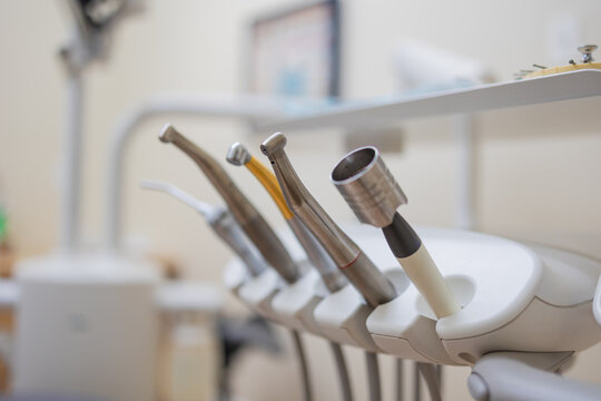 Dental Handpieces and Instruments Mounted in Dentist Chair Unit