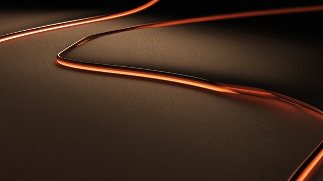 Glowing orange neon light strip follows a winding path across a dark textured surface