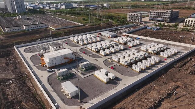 Aerial view of a large-scale energy storage power station with comprehensive facility layout and modular battery units