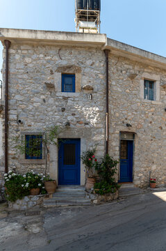 Charming stone houses in Krasi village showcasing traditional Mediterranean architecture